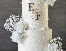 Elegant wedding cake with floral detailing