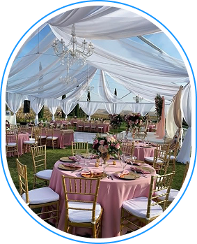 Elegant celebration table setting with custom cake and floral arrangements